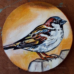 Sparrow painting acrylic on a round wooden table