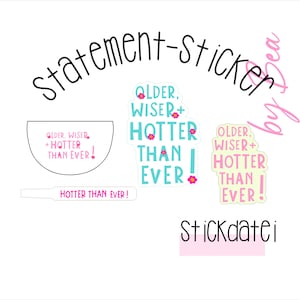 May include: A selection of stickers displaying the text "Older, Wiser, + Hotter Than Ever!" in different styles. The stickers use a variety of colours, including light blue, pink, and yellow, and are decorated with floral motifs.