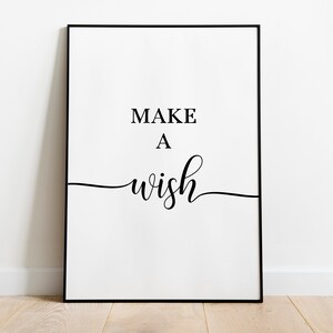 May include: Black and white framed print with the text "MAKE A WISH" in a cursive font.