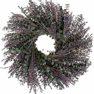May include: A lavender and eucalyptus wreath with a natural, rustic look. The wreath is made of dried lavender and eucalyptus branches, and it has a diameter of approximately 18 inches.