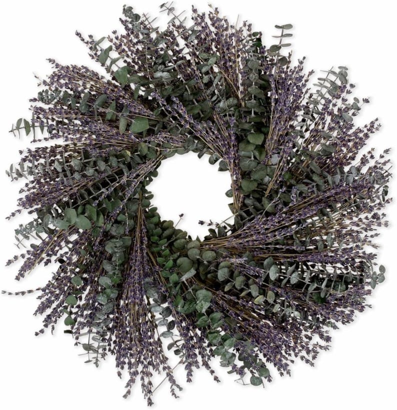 May include: A lavender and eucalyptus wreath with a natural, rustic look. The wreath is made of dried lavender and eucalyptus branches, and it has a diameter of approximately 18 inches.