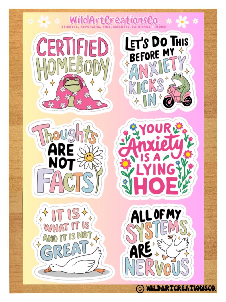 May include: A sheet of colorful stickers with whimsical designs and text. The stickers feature phrases like "Certified Homebody," "Let's Do This Before My Anxiety Kicks In," and "Thoughts Are Not Facts." The stickers have a cartoonish style with a variety of illustrations.