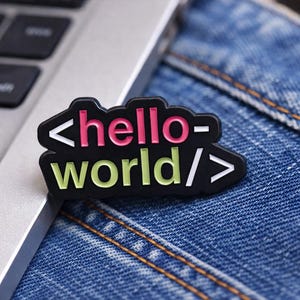 Hello World Enamel Pin – Programmer Coding Badge – Tech Humor Laptop Accessory