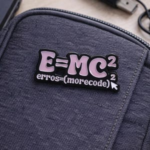 May include: A set of three ceramic mugs with a speckled, matte finish. The mugs are in shades of cream, light gray, and dark gray. Each mug has a simple, minimalist design, perfect for coffee or tea.