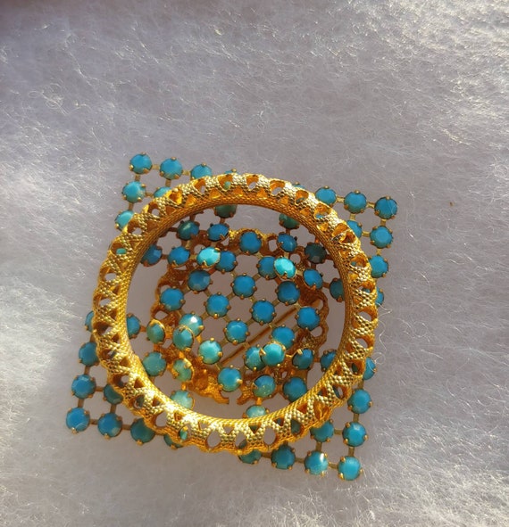 Blue and gold costume brooch - image 1