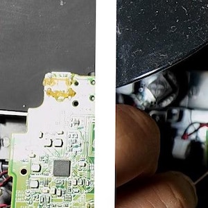 May include: Close-up of electronic repair work. A soldering iron with a green handle is used to work on a circuit board. The board is part of a black electronic device, with various components visible. The image shows the process of repairing or modifying electronics.