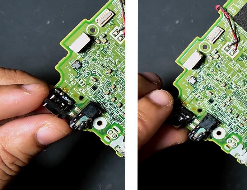 May include: Close-up of a green circuit board with various electronic components. The board is being held, showing black connectors and small, detailed circuitry. The image highlights the intricate design of the electronic device.