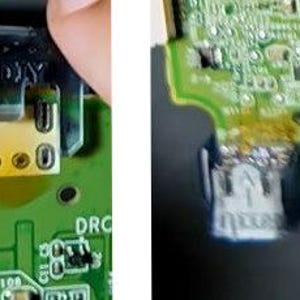 May include: Close-up of a green circuit board with a yellow and gold connector. The board has various components, including small black chips and silver solder points. The connector has multiple pins and is labeled with the text "EXDIY".
