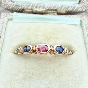 Antique ruby and sapphire five stone gold ring