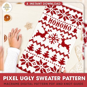 May include: A red and white macrame wall hanging with a pixelated design of a Christmas sweater. The design includes reindeer, snowflakes, and the text "HOHOHO".