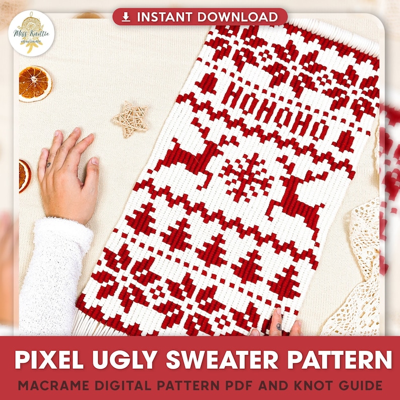 May include: A red and white macrame wall hanging with a pixelated design of a Christmas jumper. The design includes reindeer, snowflakes, and the text "HOHOHO".