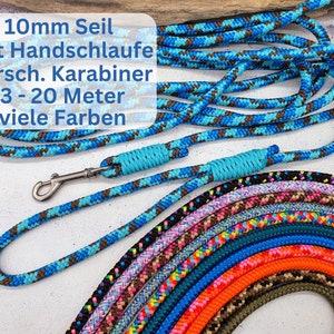 Könnte beinhalten: Eine Auswahl an bunten Hundeleinen aus 10 mm Seil mit Handschlaufe und Karabiner. Die Leinen sind in Längen von 3 bis 20 Metern erhältlich. Der Text "10mm Seil mit Handschlaufe versch. Karabiner 3 - 20 Meter viele Farben" ist im Bild sichtbar.