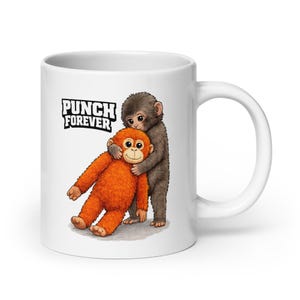 May include: White ceramic mug featuring a cartoon illustration of two monkeys. One monkey is orange, the other is gray, and they are embracing. The text "PUNCH FOREVER" is printed above the monkeys in a bold, black font.