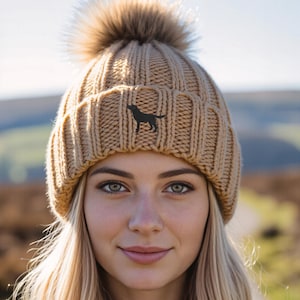 Black labrador owner clothing gifts, faux fur pom pom chunky knit super soft unisex embroidered beanie from the house of dog.