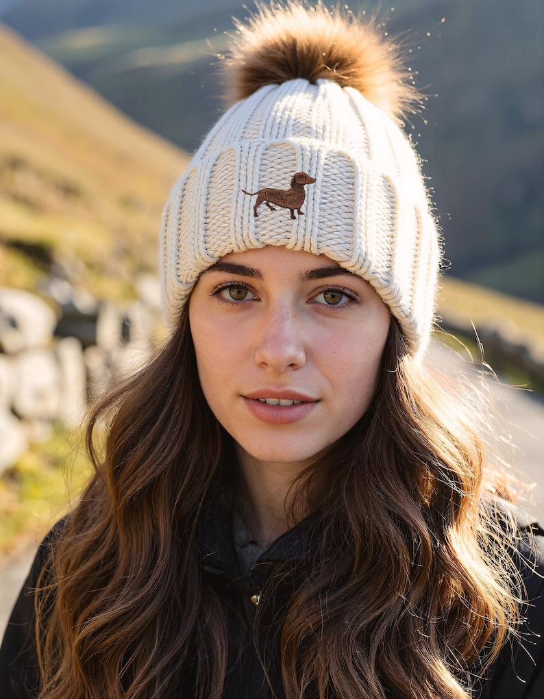 Dachshund Sausage Dog Owner Clothing Gifts, Faux Fur Pom Pom Chunky Knit Super Soft Unisex Embroidered Beanie From The House Of Dog. image 1