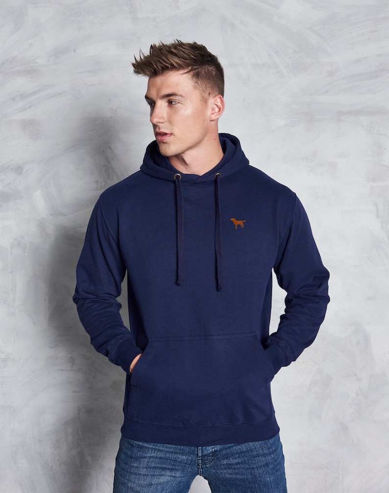 May include: A navy blue hooded sweatshirt with a small brown dog logo on the left chest. The sweatshirt has a kangaroo pocket and a drawstring hood.