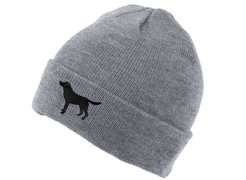 May include: A gray beanie with a black embroidered silhouette of a Labrador Retriever.