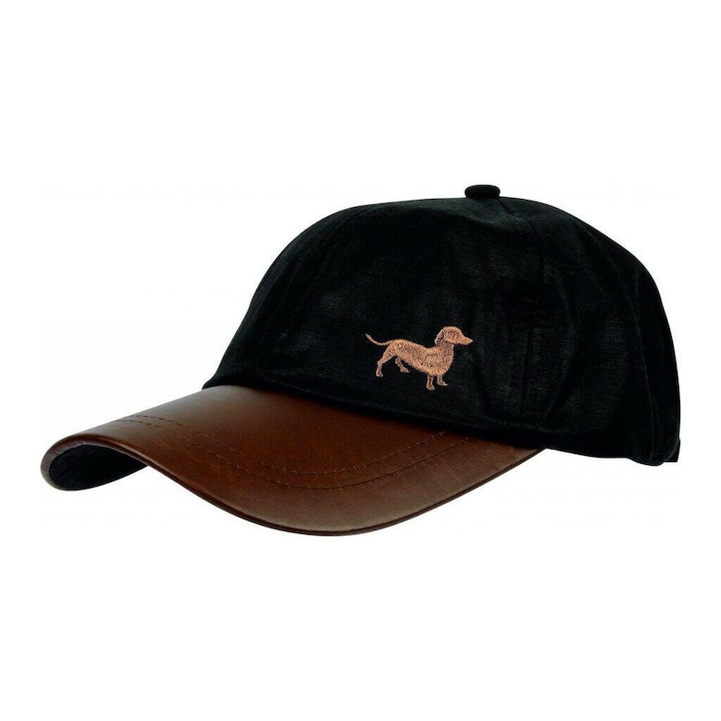 May include: A black baseball cap with a brown leather brim. The cap has an embroidered dachshund on the front.
