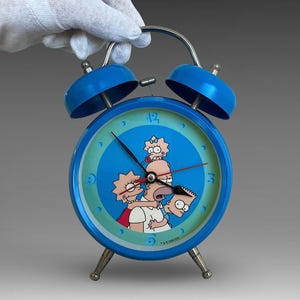 VTG 1998 "The Simpsons" Blue Metal Alarm Clock - Pop Culture Collectible - by Fox - Matt Groening - (6.75 inch / 17 cm)