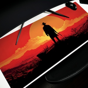 May include: A red and orange sunset scene with a silhouette of a person wearing a hat and holding a gun. The scene is set in a desert landscape with mountains in the background.