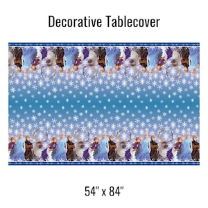May include: Decorative table cover featuring characters and imagery from a popular animated film. The blue tablecloth has a snowflake pattern and measures 54 x 84 inches. The text "Decorative Tablecover" is at the top.