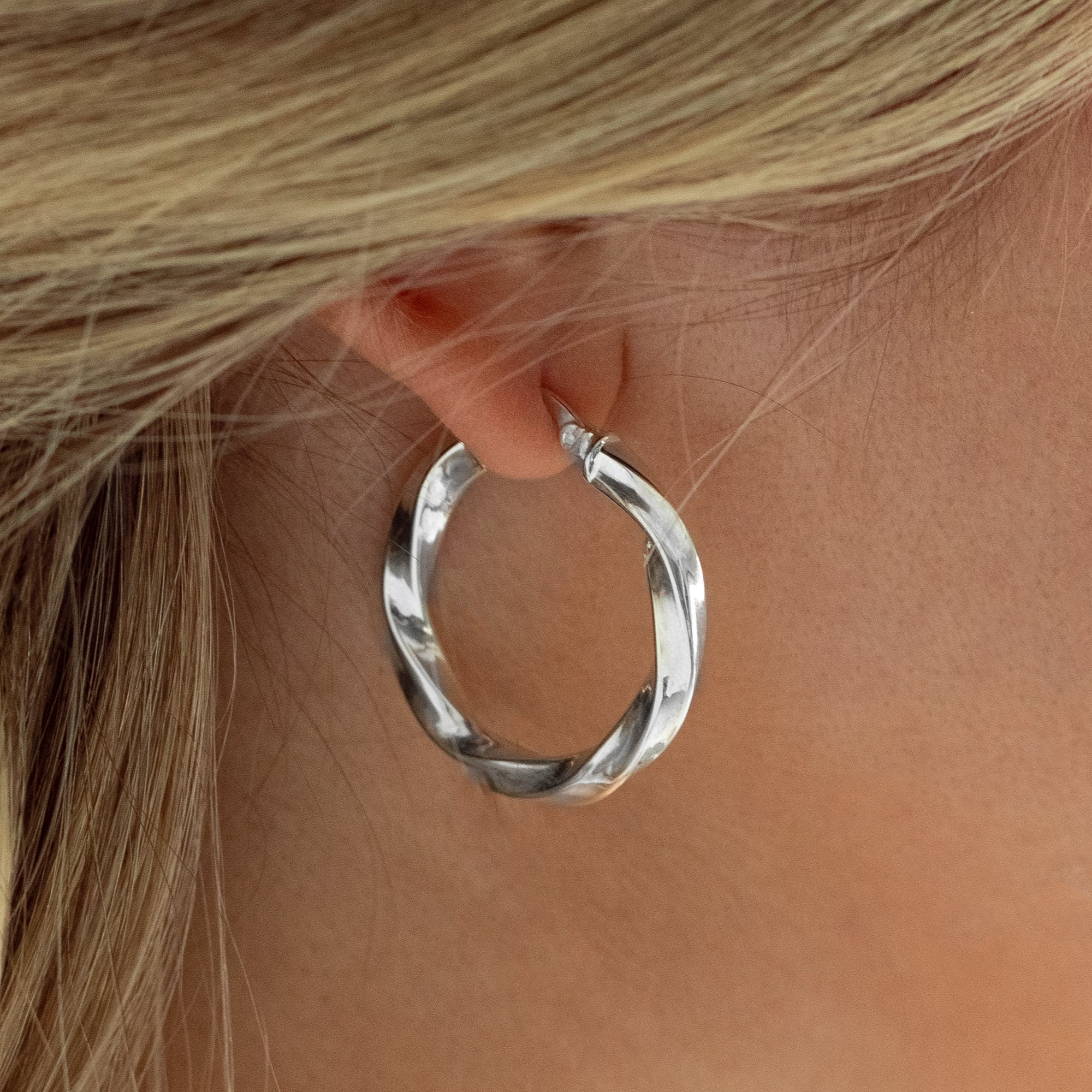 Twisted silver hoop earrings deals