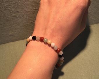 Green Jade Artisan Bead Bracelet with stretch cord 6.5 inch length Jade brings Good Luck and Longevity GJB01 Green Jade Artisan Bead Bracelet with stretch cord 6.5 inch length Jade brings Good Luck and Longevity GJB01