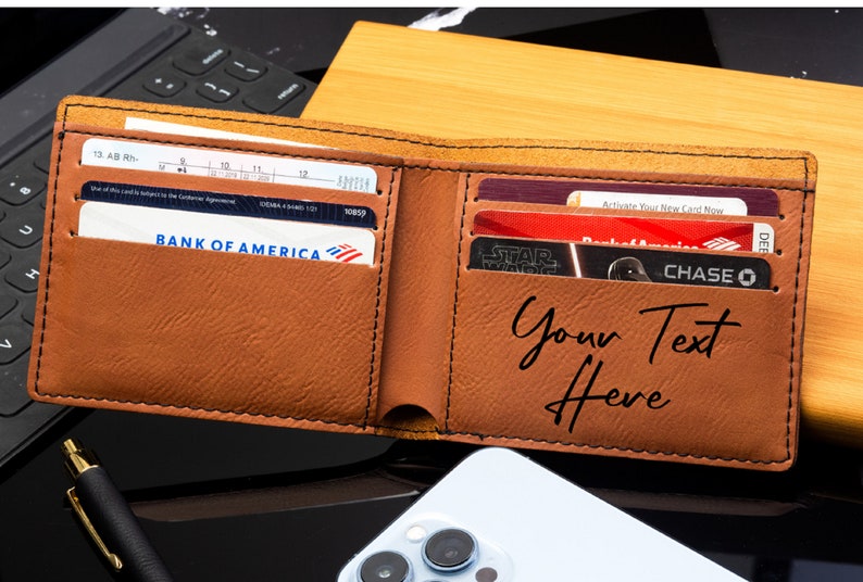 May include: A brown leather wallet with multiple card slots and a personalized inscription that reads "Your Text Here".