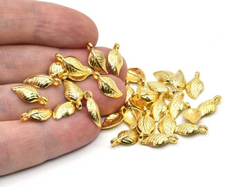 7 x 14 mm 24k glanzende vergulde bladbedel, bladbedels, kleine bladbedels, bladhanger, bladketting, groothandel sieradenleverancier