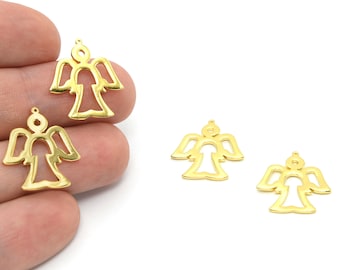 May include: Several small, gold-colored angel charms are displayed against a white background. The charms have a cutout design, with wings and a halo. These charms are ideal for jewelry making or other craft projects.