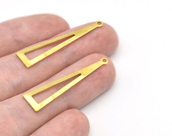 May include: Two gold-colored metal earring components. Each component is a long, thin rectangle with a triangular cutout and a small hole at one end. The components are displayed against a white background.