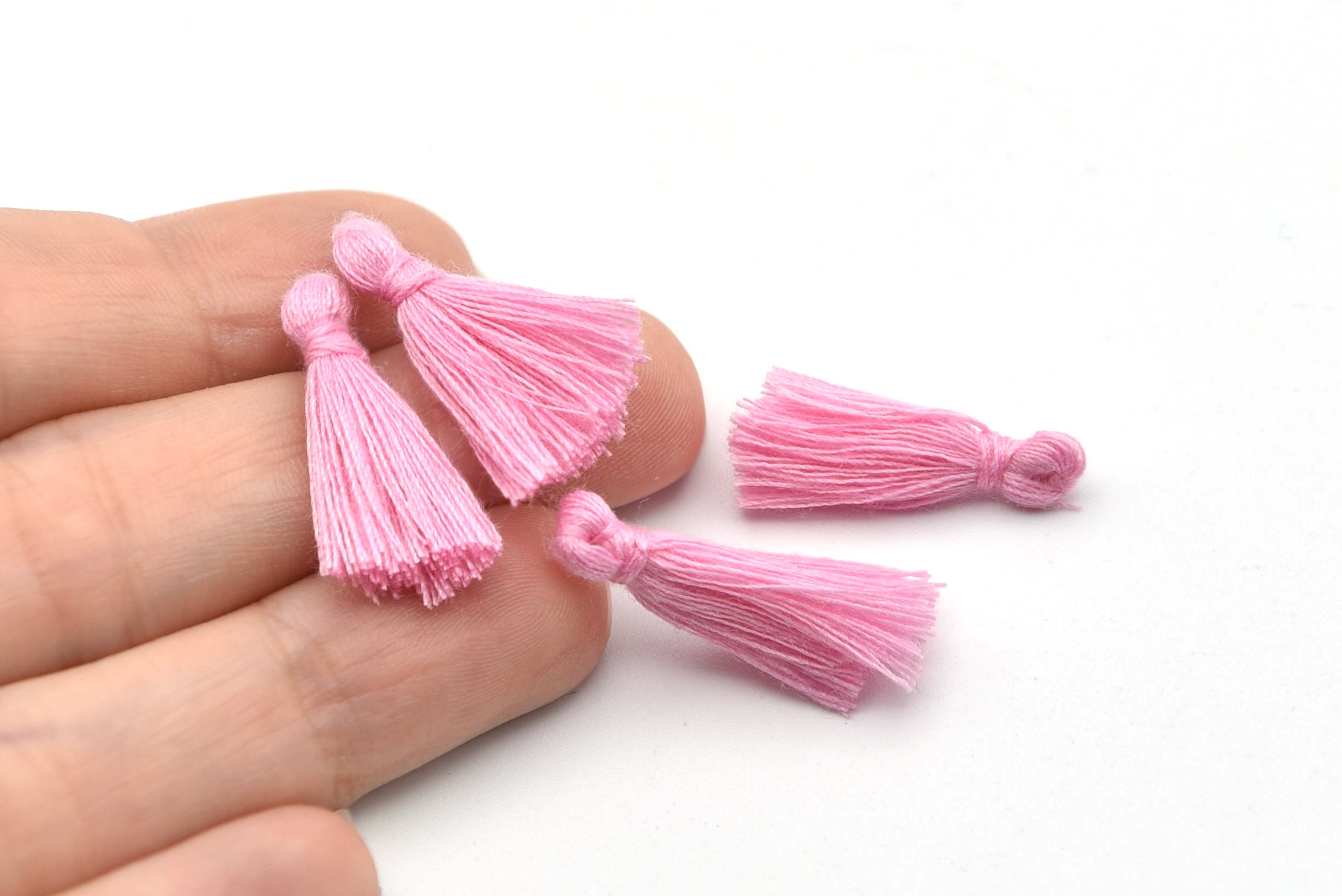 pink tassel mules
