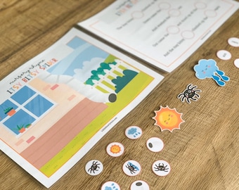 May include: An educational activity set for the nursery rhyme Itsy Bitsy Spider, featuring a printed scene of a house with a downspout, a lyric sheet, and various small circular cutouts depicting a spider, a sun, and a rain cloud.