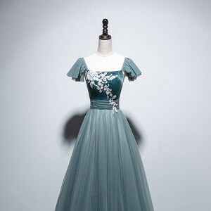 Vestidos de 15 años color verde jade con plata sales