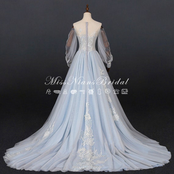 White wedding dress with royal deals blue