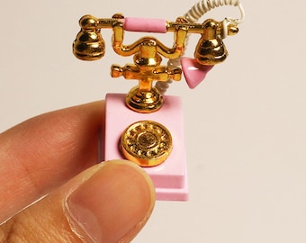 Teléfono de disco giratorio en miniatura para muñecas a escala 1/6 y 1/12. Teléfono de escritorio rosa para casa de muñecas.