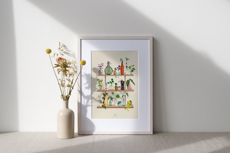 May include: A framed print of a shelf with various plants and glass bottles in different shapes and sizes. The shelf is made of wood and has a light brown finish. The plants are green and have leaves of various shapes and sizes. The bottles are clear and some have a green tint. The print is on a cream background.