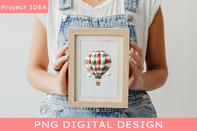 May include: A framed illustration of a red and green striped hot air balloon with white clouds and a basket. The balloon is floating in the air.