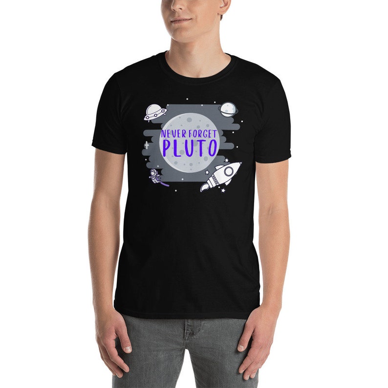 May include: Black t-shirt with a white moon, stars, and a rocket ship. The text "NEVER FORGET PLUTO" is in purple.