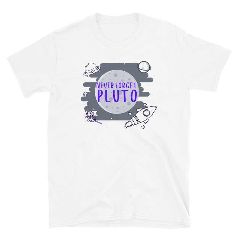 May include: White t-shirt with a gray moon and the text "NEVER FORGET PLUTO" in purple. The design also includes a rocket, an astronaut, a UFO, and a planet.