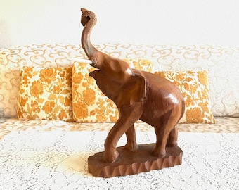 Vintage Wooden Elephant. Hand Carved on One Solid Wood. Trunk is an Added Piece.  17.76 “ Tall.