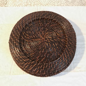 Handwoven Rattan Placemats or chargers.  One Set of 4. 13” wide.