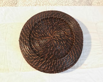 Handwoven Rattan Placemats or chargers.  One Set of 4. 13” wide.