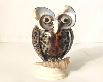 Owl Vase or Pen Holder. Cowrie and other shells. 5” tall.