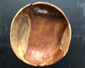 Teakwood Bowl. Beautiful Wood Grain. Hand carved. Natural oils finish. Use as a decorative, fruit or utility bowl. 11” diameter.