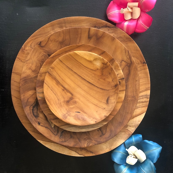 Teakwood dinner plates. Hand carved. Finished with food grade natural oils. 4 sizes.