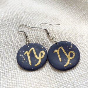 Clay Earrings | Handmade, Hand-painted Capricorn Dangle Earrings | Polymer Clay and Stainless Steel | 1-inch Round Dangle Earrings