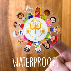 May include: A clear sticker featuring a circular design with smiling children from around the world. The sticker has a white background with a gold emblem and the word "WATERPROOF!" in white text.