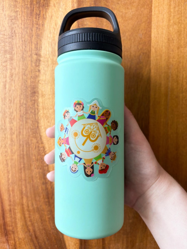 May include: A light teal water bottle with a black handle and lid. The bottle features a colorful sticker with cartoon figures around a sun with the text "it's a small world".