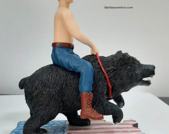 putin riding bear action figure